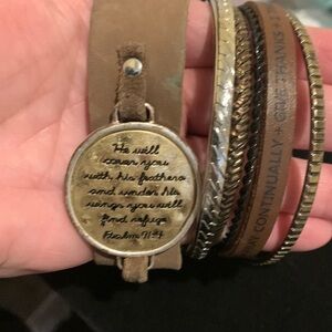 Lot of 7 bracelets. 5 bangles and 2 faux leather